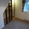 Photo 2: Large inbuilt cupboard space - includes shelves and hanging rail