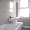 Photo 15: The bathroom with bath and shower plus toilet