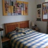 Photo 3: Dbl Room with wardrobe, bedside cabinet and large chest of drawers.