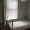 Photo 5: Room 1: Single bedroom (6.75 x 9 ft)