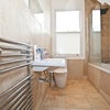 Photo 4: Double Bed 2: Bright bathroom with window