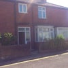 Photo 2: Side view of property from service road.