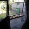 Photo 3: This is the view of the back garden and garage