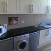 Photo 5: Big kitchen/ dining area.