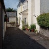 Photo 9: Rear view of house into courtyard