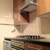 Photo 5: Modern Kitchen side view