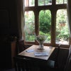 Photo 6: View into the garden from the dining/living room