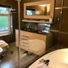 Photo 5: Main bathroom with jacuzzi bath & TV