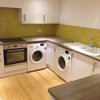 Photo 4: Bottom kitchen with two W/M and two T/D