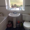 Photo 3: Bathroom with bath/shower . Another toilet upstairs