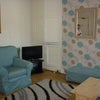 Photo 2: The Shared Living Room