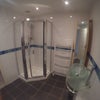 Photo 8: There is a separate bathroom shower on the first floor