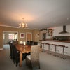 Photo 2: Open plan dining area and lounge