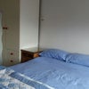 Photo 6: The room with bed and wardrobe