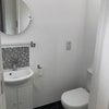 Photo 4: Bathroom showing toilet
