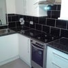 Photo 1: Kitchen