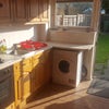 Photo 5: cooker, oven & washing machine with view of garden