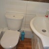 Photo 5: Ensuite bathroom with WC, wash basin and power shower