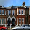 Photo 7: Exterior Facade