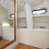Photo 5: Full bath with powerful shower