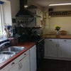 Photo 2: Kitchen with Breakfast Area beyond