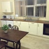 Photo 2: Kitchen/living area