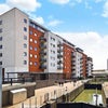 Photo 5: The building with private balcony overlooking Bow Back River :)
