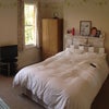 Photo 3: Bedroom 1 white duvet
