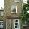 Photo 2: rear of house