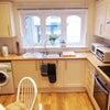 Photo 6: Luxury kitchen with appliances.