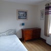 Photo 9: A single room within the property, currently unavailable