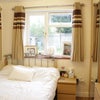 Photo 2: Bedroom - Double bed, curtains, wardrobe, chest of drawers