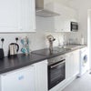 Photo 5: Fully equipped kitchen area