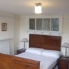 Photo 5: Double bedroom with antique furniture