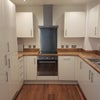 Photo 4: Kitchen with large dining table