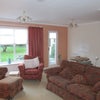 Photo 3: Spacious double aspect shared living room.