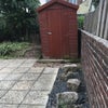 Photo 2: Sunny, paved low maintenance back garden