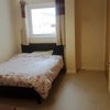 Photo 4: Fully furnished with large built-in wardrobe and chest of drawers for storage.