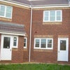 Photo 2: Rear of house