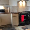Photo 7: Seven burner, three oven range