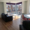 Photo 5: Living room/kitchen with double window view