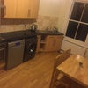 Photo 2: Kitchen / Dining Room