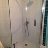 Photo 2: There are three toilets, 2 showers and a bath