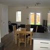 Photo 9: Open plan communal living area with smart tv