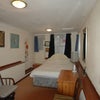 Photo 4: Bedsit with rear entrance door