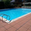Photo 3: Communal outdoor heated swimming pool