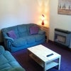 Photo 5: Spacious living area.