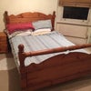 Photo 2: bed and window at night