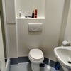Photo 7: Shower is on the left next to the toilet 