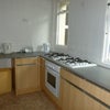 Photo 2: part one of kitchen